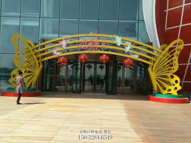 西吉蝴蝶拱门雕塑,镂空烤漆效果,不锈钢小区标识雕塑 西吉蝴蝶拱门雕塑,镂空烤漆效果,不锈钢小区标识雕塑