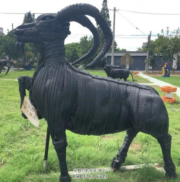 同心轮胎山羊雕塑供应，公园雕塑，铸铜轮胎羊雕塑供求